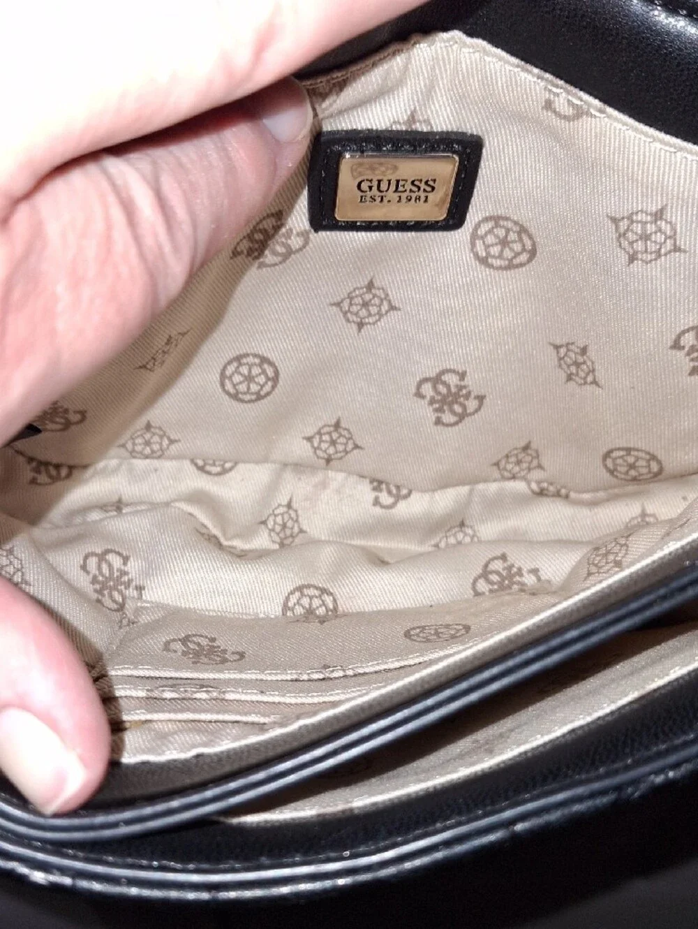 GUESS Black Embossed Leather Shoulder Bag with Gold Chain and Charm Accent